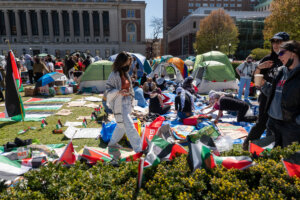 Pro-Palestinian supporters set up a protest encampment on the campus of Columbia University Monday. All classes at Columbia University have been held virtually today after school President Minouche Shafik announced a shift to online learning in response to recent campus unrest.