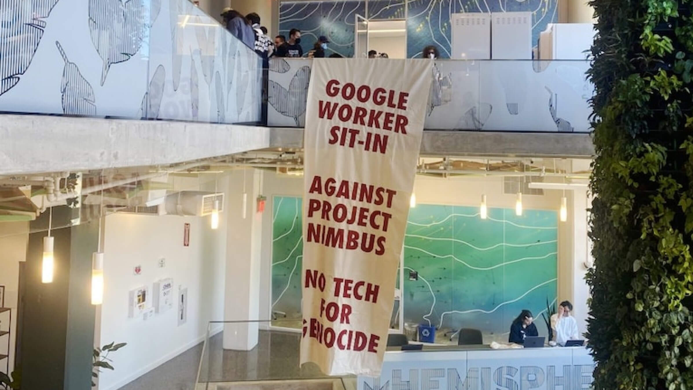 A banner hung by protesters who staged a sit-in Tuesday at Google's New York City offices.