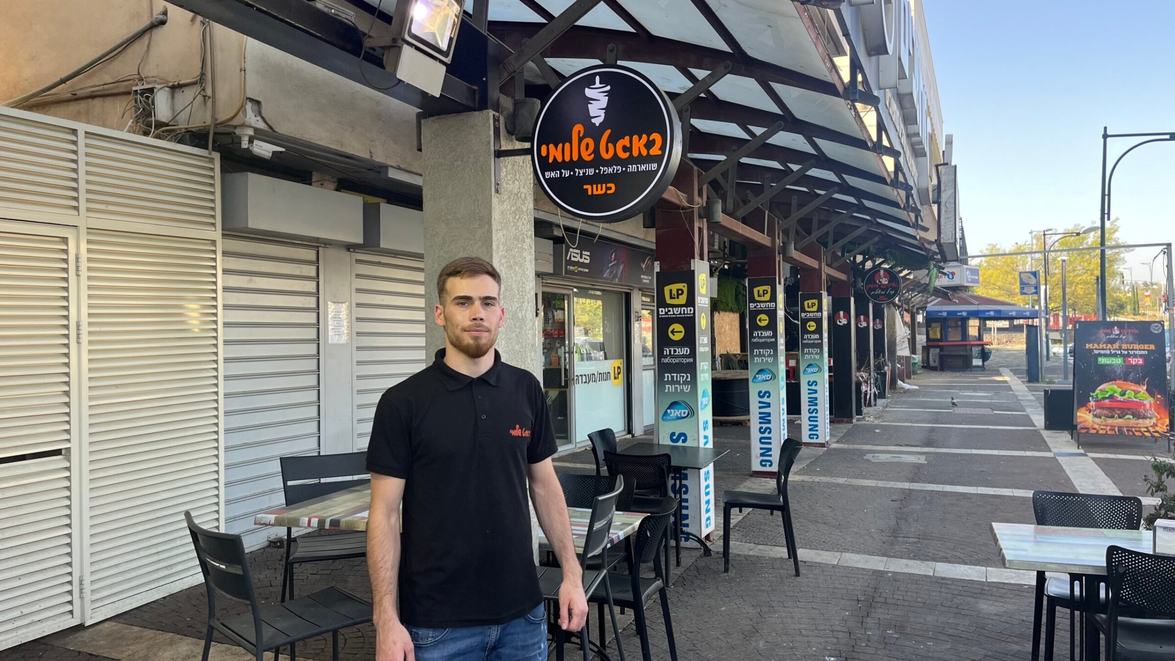 Toby Abutbul has stayed in Kiryat Shmona to run his family’s restaurant despite the evacuation of the city due to war. (Uriel Heilman)