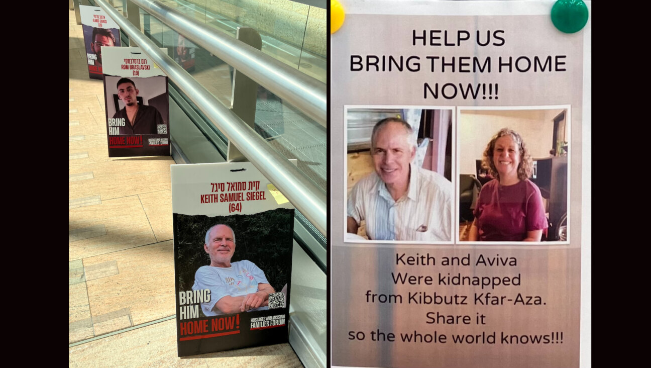 A hostage poster showing Keith Siegel can be seen at Israel’s Ben-Gurion Airport. His wife Aviva was freed from Gaza in November, but posters from when they were both hostages can still be found if one looks carefully across Israel. (Jane Gabin)