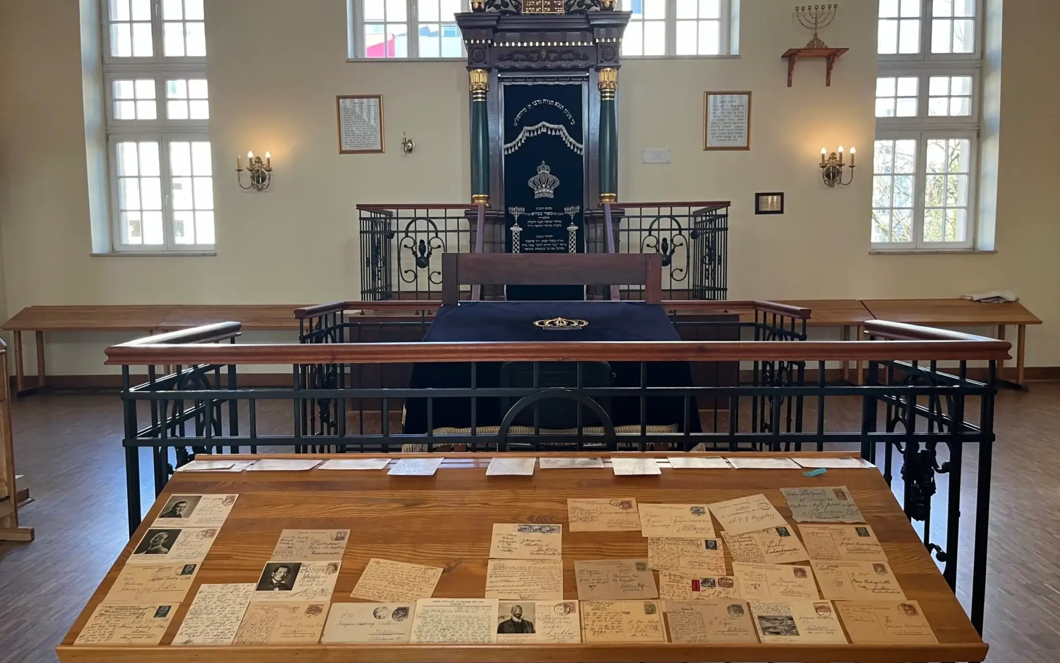 A display of looted postcards inside the former Chachmei Lublin yeshiva.