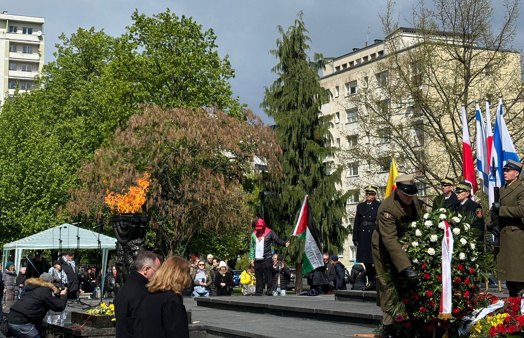A single pro-Palestinian protester took the stage briefly at the official ceremony to commemorate the 81st anniversary of the Warsaw Ghetto Uprising in Poland, April 19, 2024. (Gabe Miner)