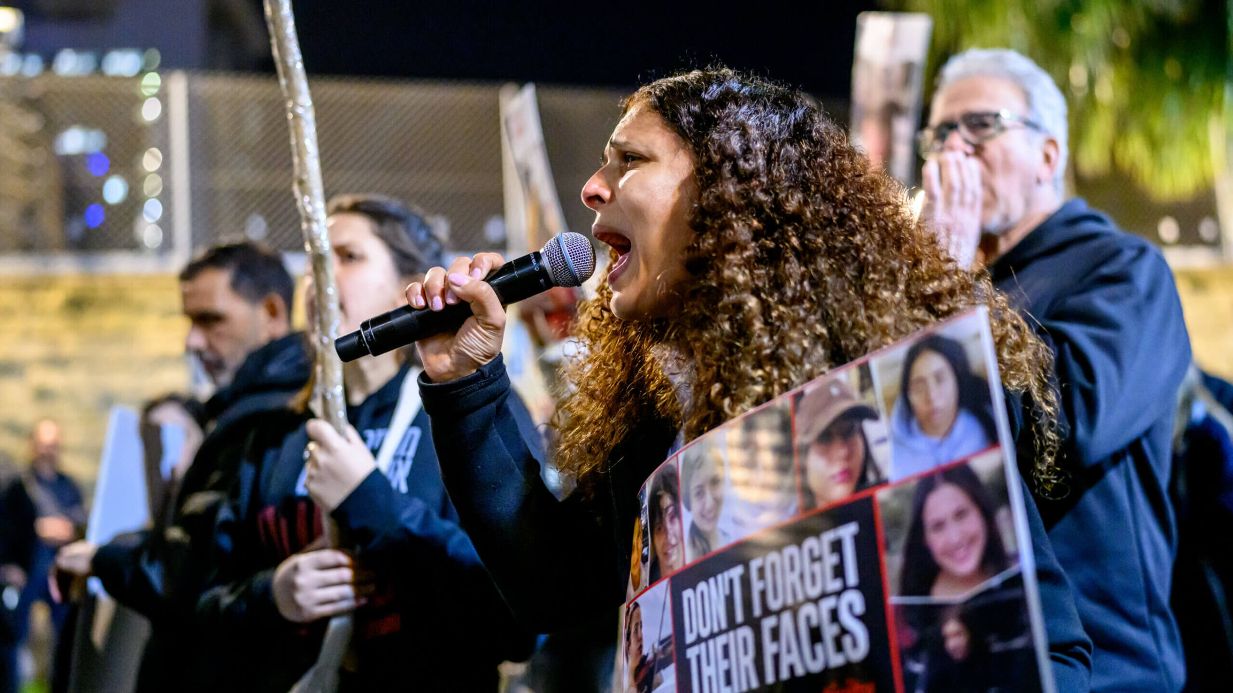 A woman shouts at a protest at HaKirya base, which serves as IDF headquarters, to demand the return of the hostages held by Hamas, Feb. 20, 2024 in Tel Aviv, Israel. 