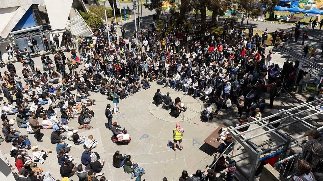 Hundreds of observers pack the quad at San Francisco State University for an open negotiation session between pro-Palestinian protesters and university administrators on Monday, May 6.