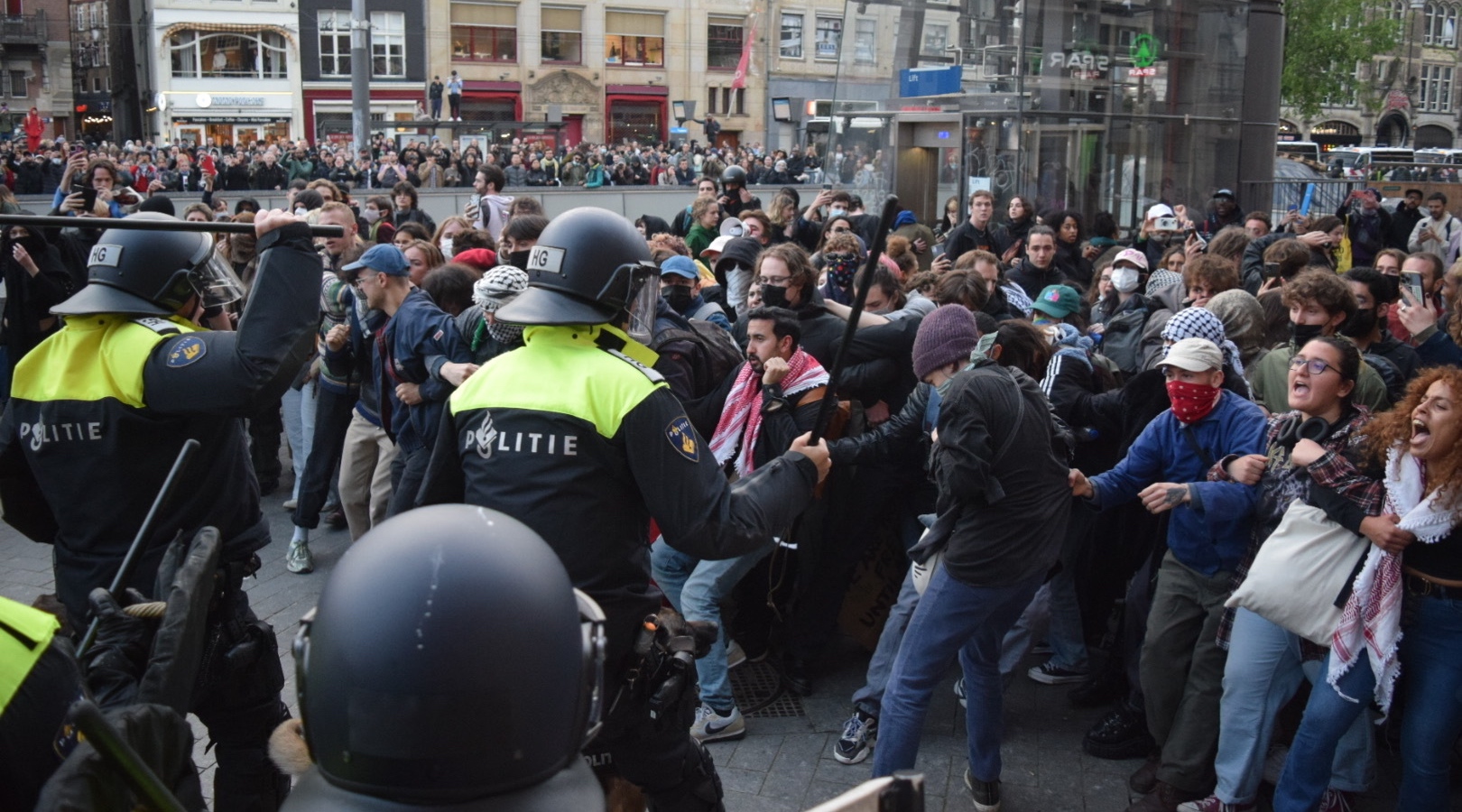 Police face pro-Palestinian protesters at the University of Amsterdam, May 8, 2024. (Mouneb Taim/Anadolu via Getty Images)