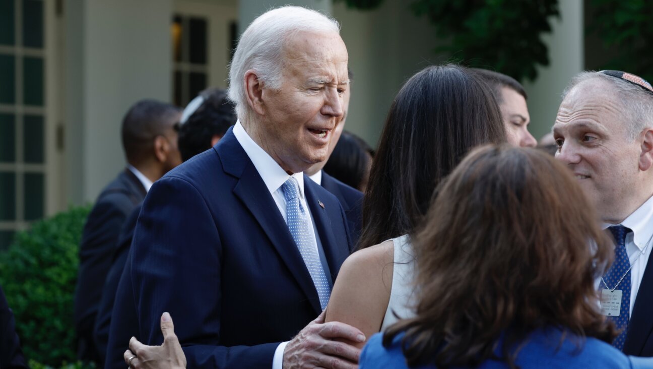 U.S. President Joe Biden greets guests after speaking at a reception celebrating Jewish American Heritage Month in the Rose Garden of the White House, May 20, 2024. (Anna Moneymaker/Getty Images)