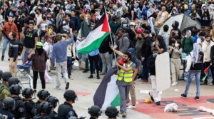 Police officers clash with pro-Palestinian demonstrators at the University of California at Irvine (UCI) on May 15, 2024 in Irvine, California. (Qian Weizhong/VCG via Getty Images)