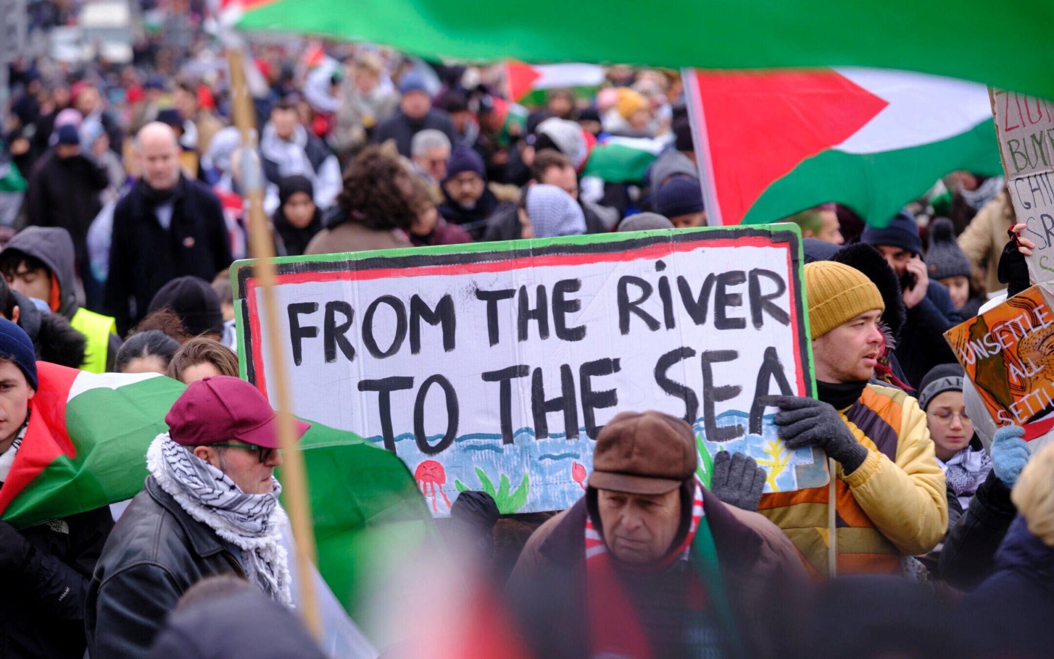 A sign reading “From the river to the sea” can be seen in a pro-Palestinian demonstration in Brussels, Belgium, Jan. 21, 2024 (Thierry Monasse/Getty Images)