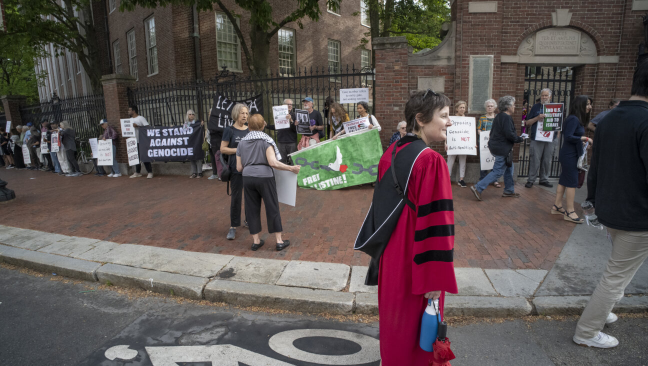 Pro-Palestinian demonstrators protest outside Harvard Yard during the university's 2024 graduation on Thursday 
