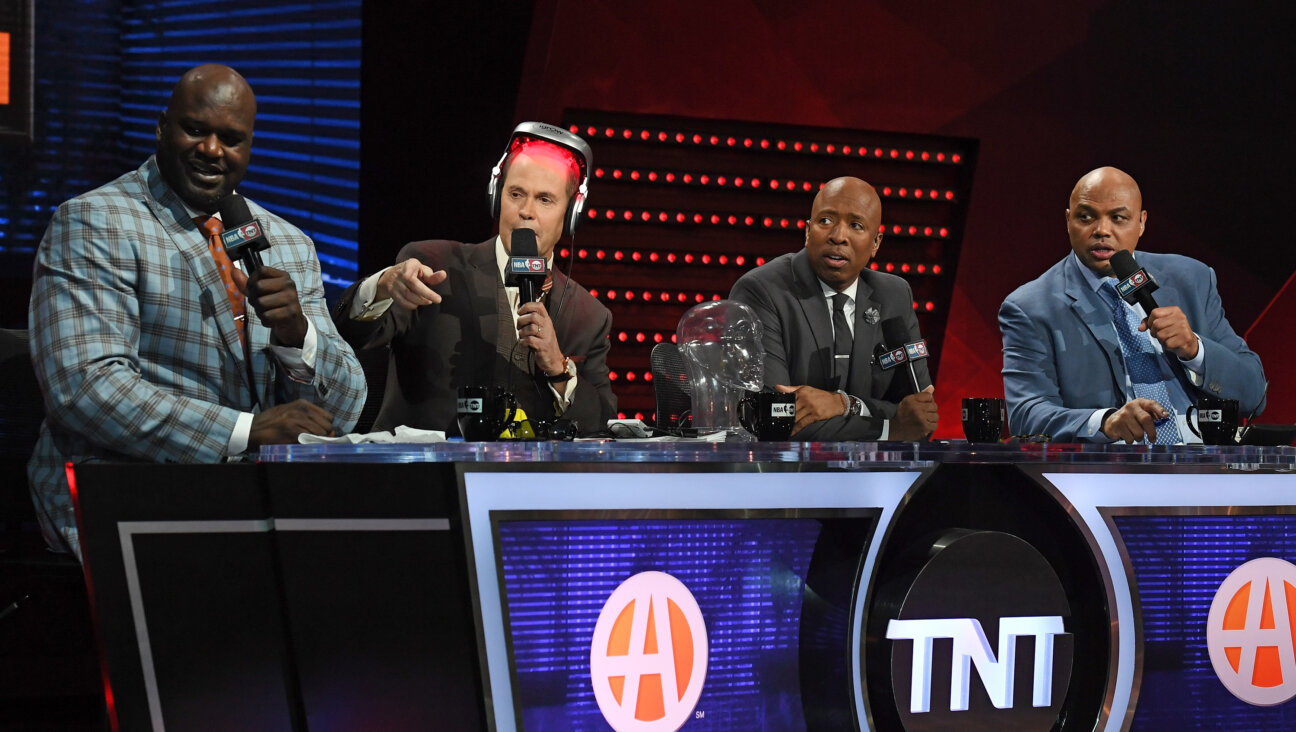 TNT's Inside the NBA team: from left, Shaquille O'Neal, Ernie Johnson Jr. (wearing a prop), Kenny Smith and Charles Barkley.