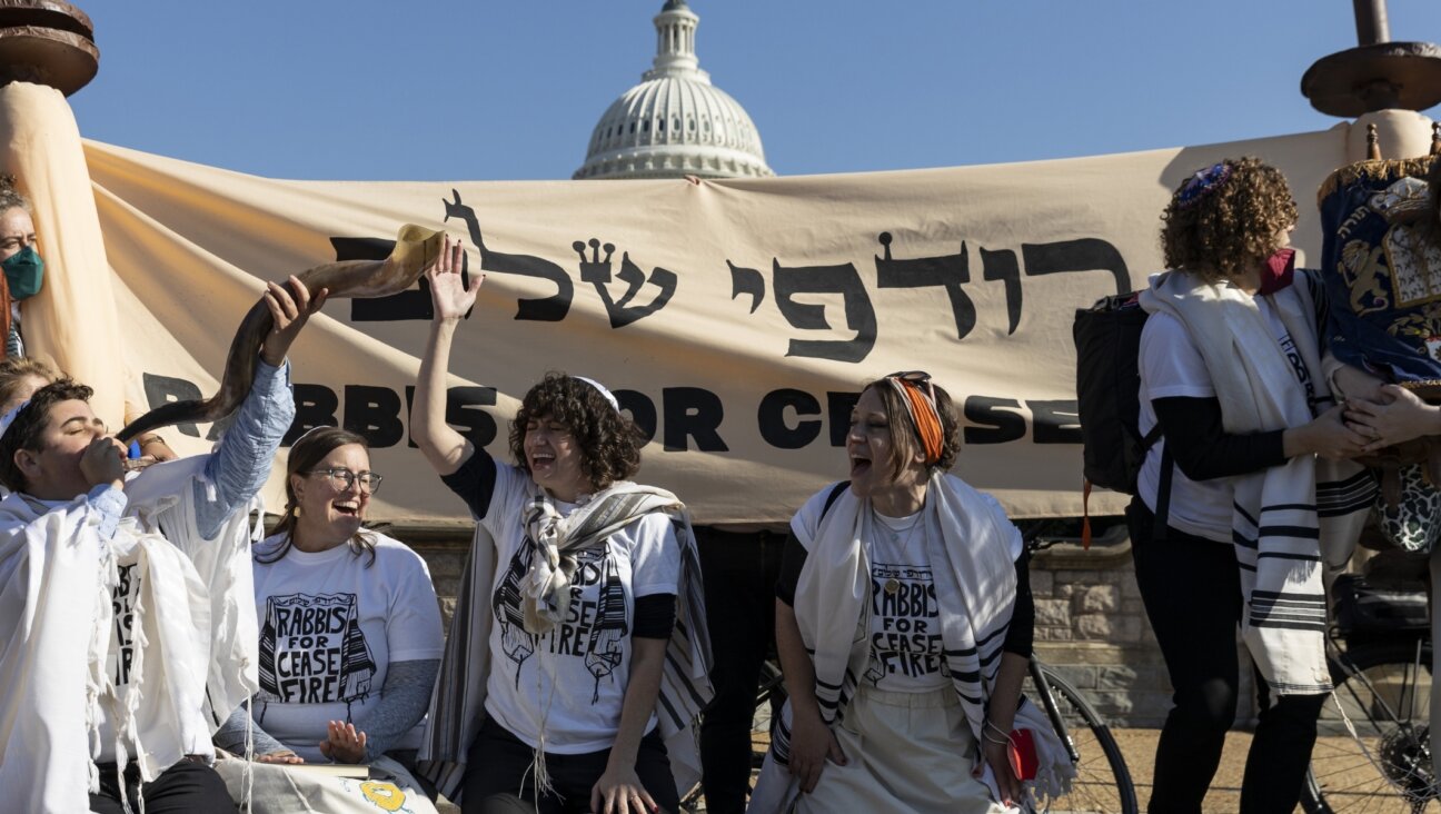 Student rabbi Louisa Solomon (fourth from left, wearing orange headband) attends a Rabbis for Ceasefire prayer and demonstration at Capitol Hill in November 2023. (Mostafa Bassim/Anadolu via Getty Images)