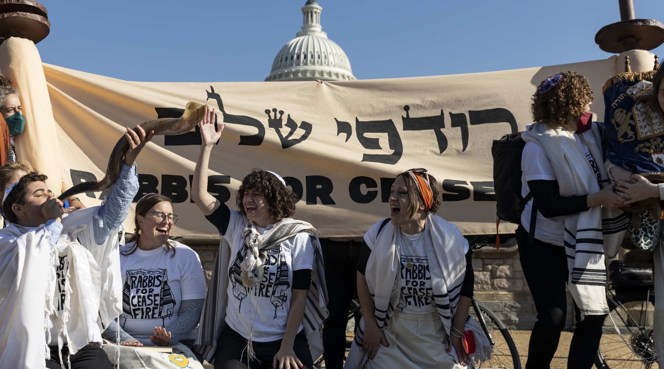 Student rabbi Louisa Solomon (fourth from left, wearing orange headband) attends a Rabbis for Ceasefire prayer and demonstration at Capitol Hill in November 2023. (Mostafa Bassim/Anadolu via Getty Images)