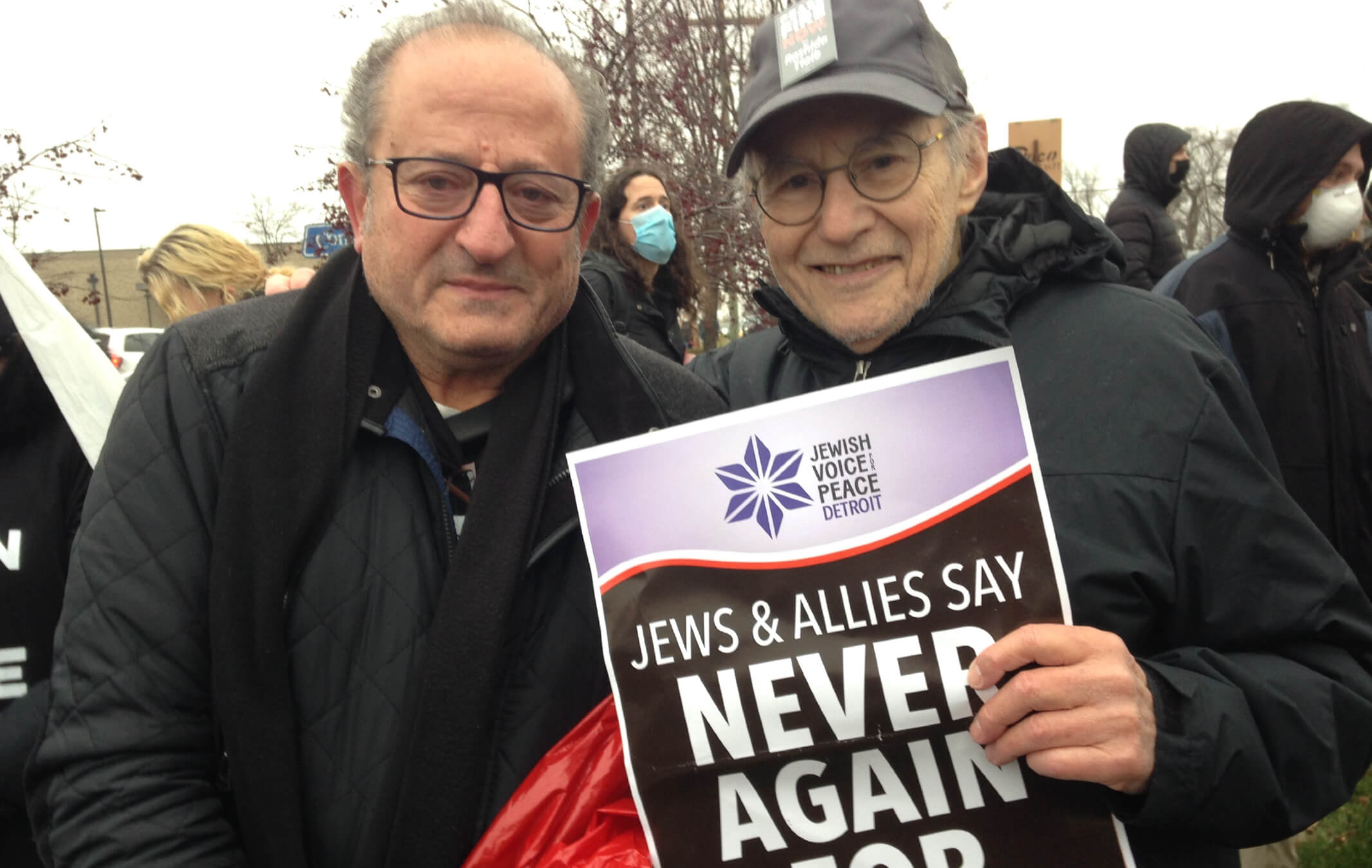 Rene Lichtman, <i>right</i>, poses with Palestinian activist Nabil Sater at a suburban Detroit ceasefire protest in December, where both men laid down in the street together to raise awareness.