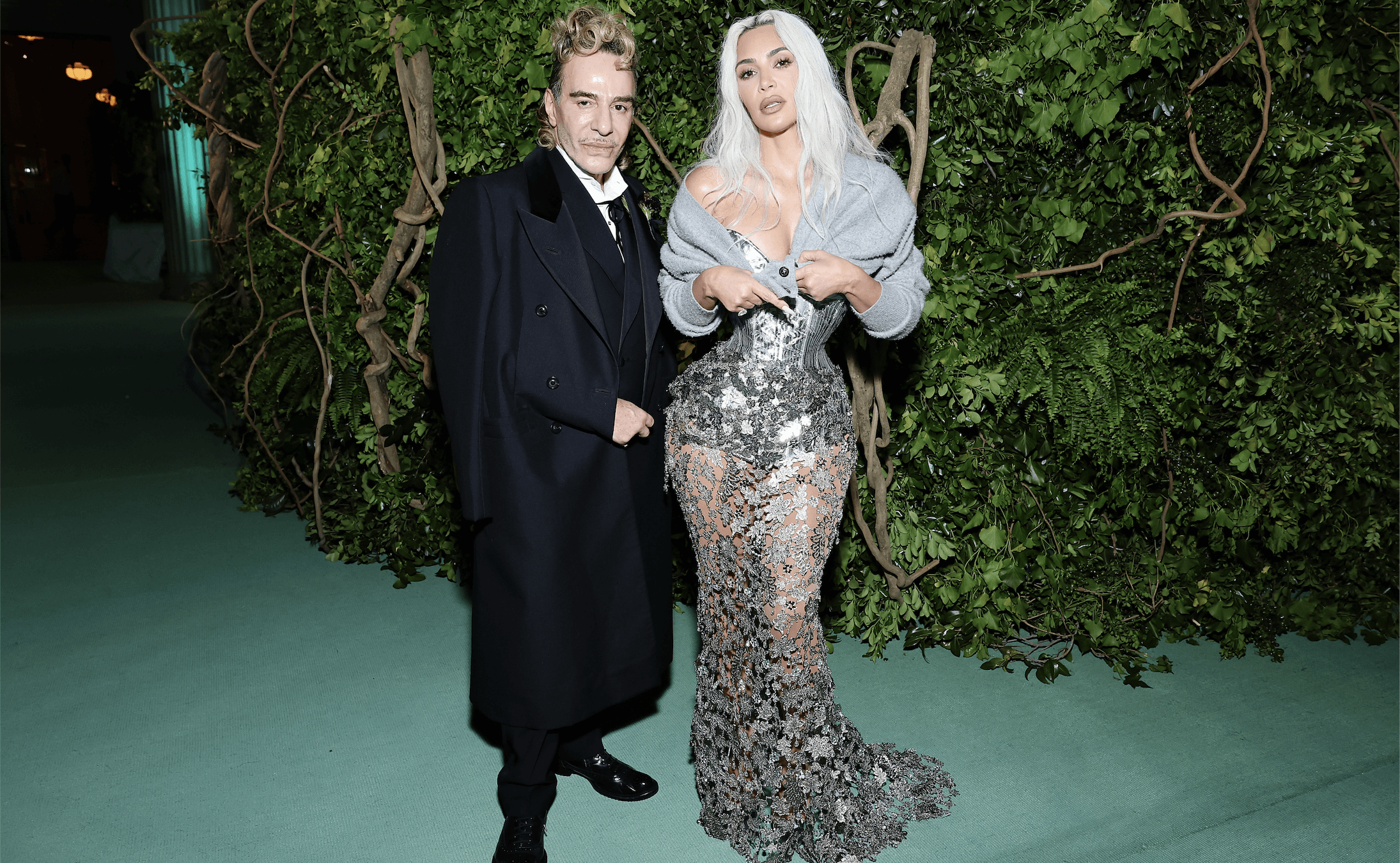 Kim Kardashian and John Galliano, who designed her dress.