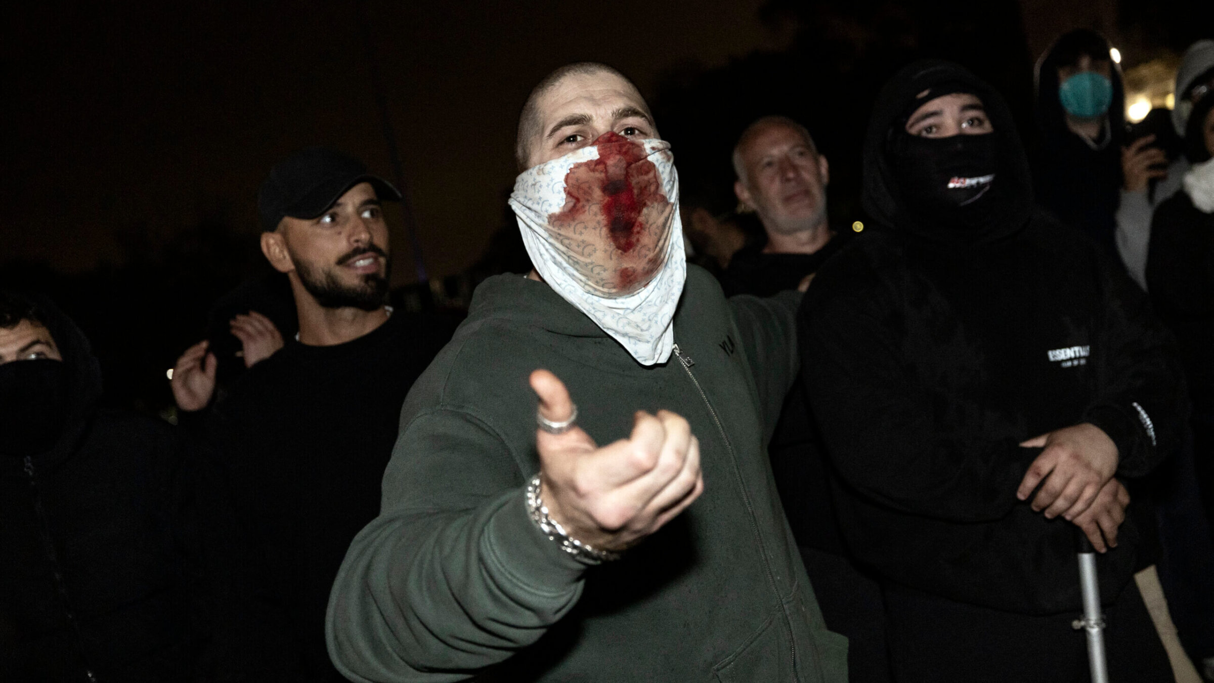 A counter protester shouts at pro-Palestinian protesters at a pro-Palestinian encampment set up on the campus of the University of California, Los Angeles on May 1.