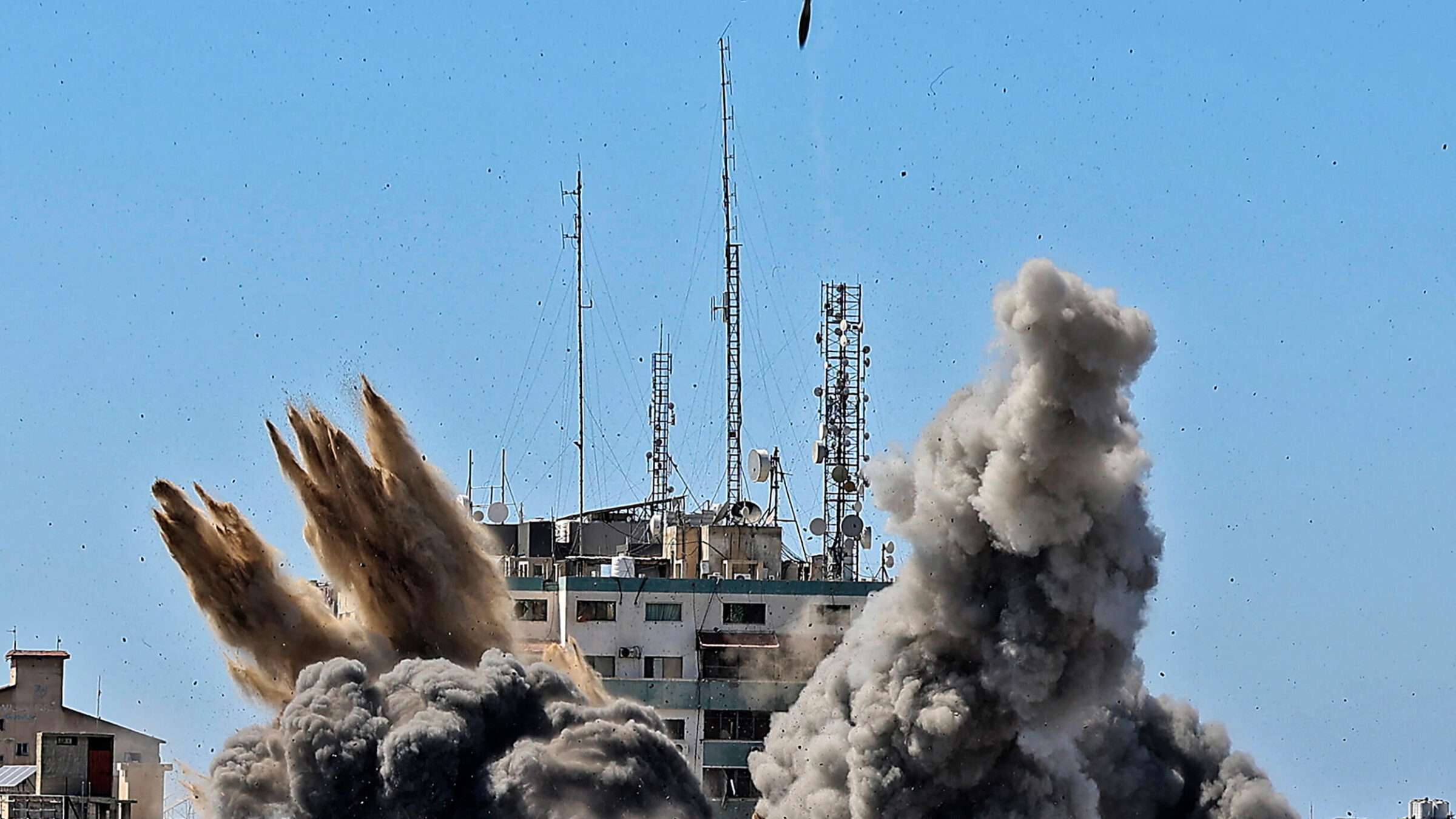 Smoke billows amid an Israeli airstrike on the Jala Tower, which housed Associated Press offices in Gaza, in 2021.