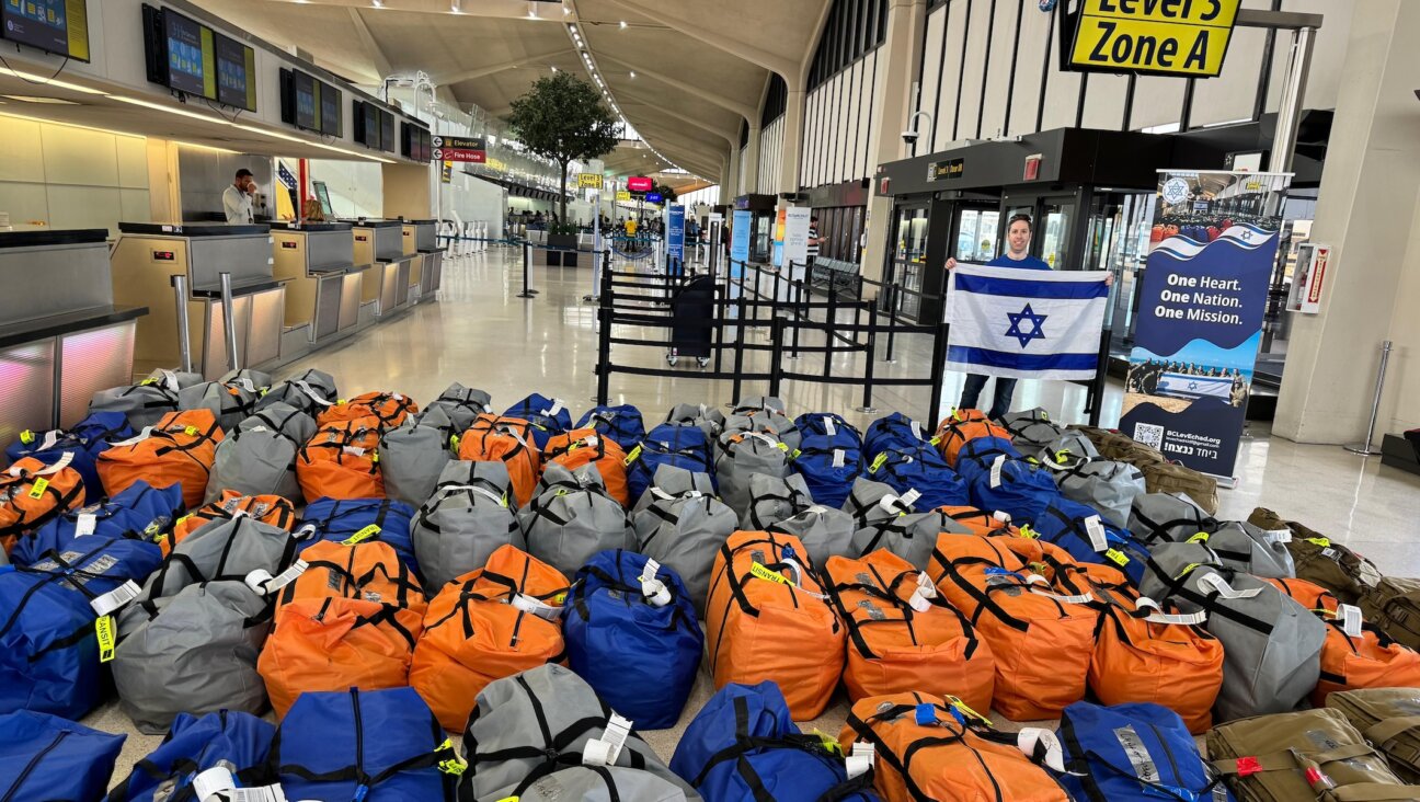 Duffle bags full of donated equipment organized by Bergen County Lev Echad are laid out for transport to Israel at Newark Liberty International Airport, April 10, 2024 (Courtesy of Bergen County Lev Echad)