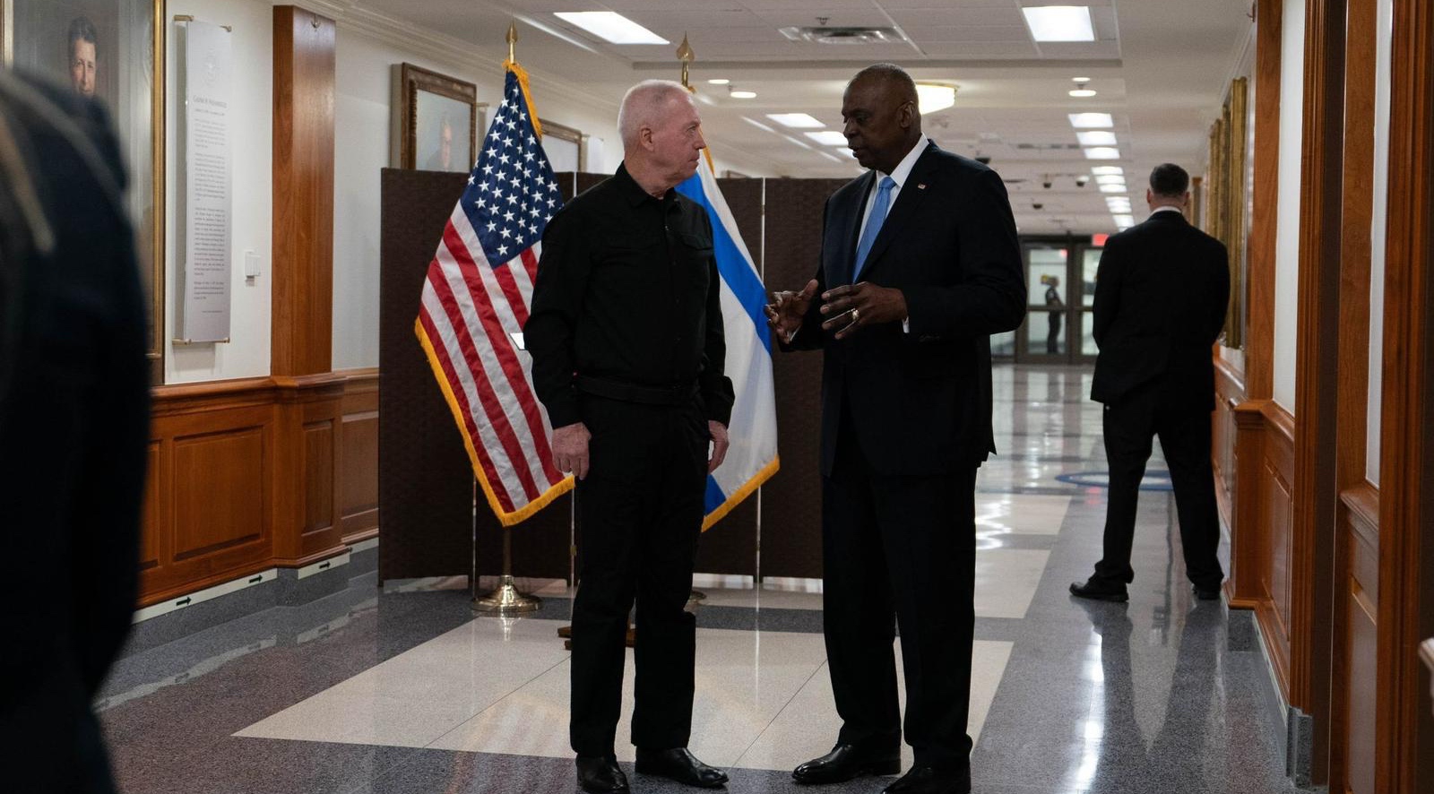 Israeli Defense Minister Yoav Gallant, left, chats with U.S. Defense Secretary Lloyd Austin in the Pentagon, June 25, 2024. 