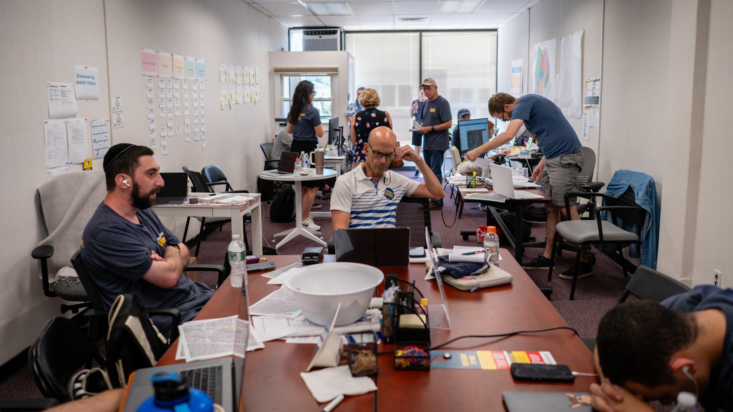 Volunteers staff the phones in the Westchester Unites office in New Rochelle, New York, June 19, 2024. (Luke Tress)