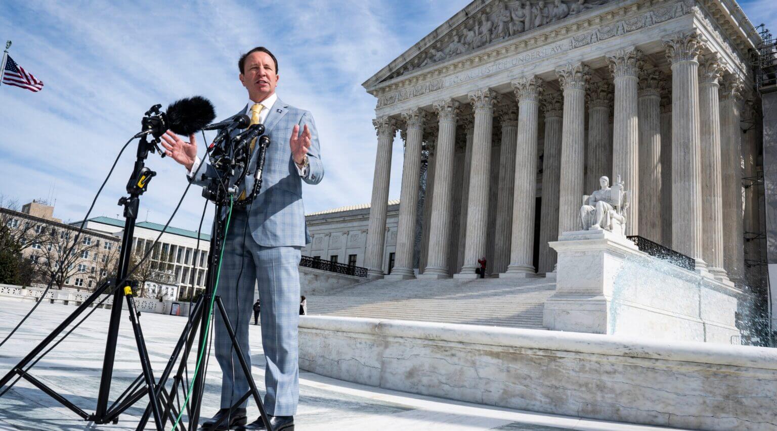 Louisiana Gov. Jeff Landry addresses reporters after a U.S. Supreme Court first amendment case in March, 2024.
