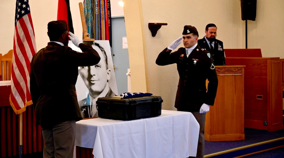 German and American soldiers at Ramstein Air Force Base, Germany honor Nathan Baskind’s remains after their excavation. (U.S. Army)