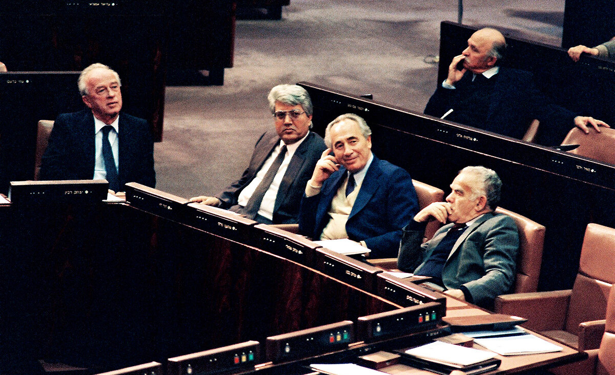 David Levy, second from left, with (from left) Yitzhak Rabin, Shimon Peres and Yitzhak Shamir in the Knesset in 1988.