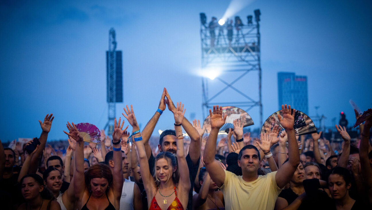 Thousands attend a party in Tel Aviv in memory of the victims murdered at the Nova festival by Hamas terrorists on Oct. 7, and calling for the release of the hostages still held captive by Hamas in Gaza, June 27, 2024. (Yonatan Sindel/Flash90)