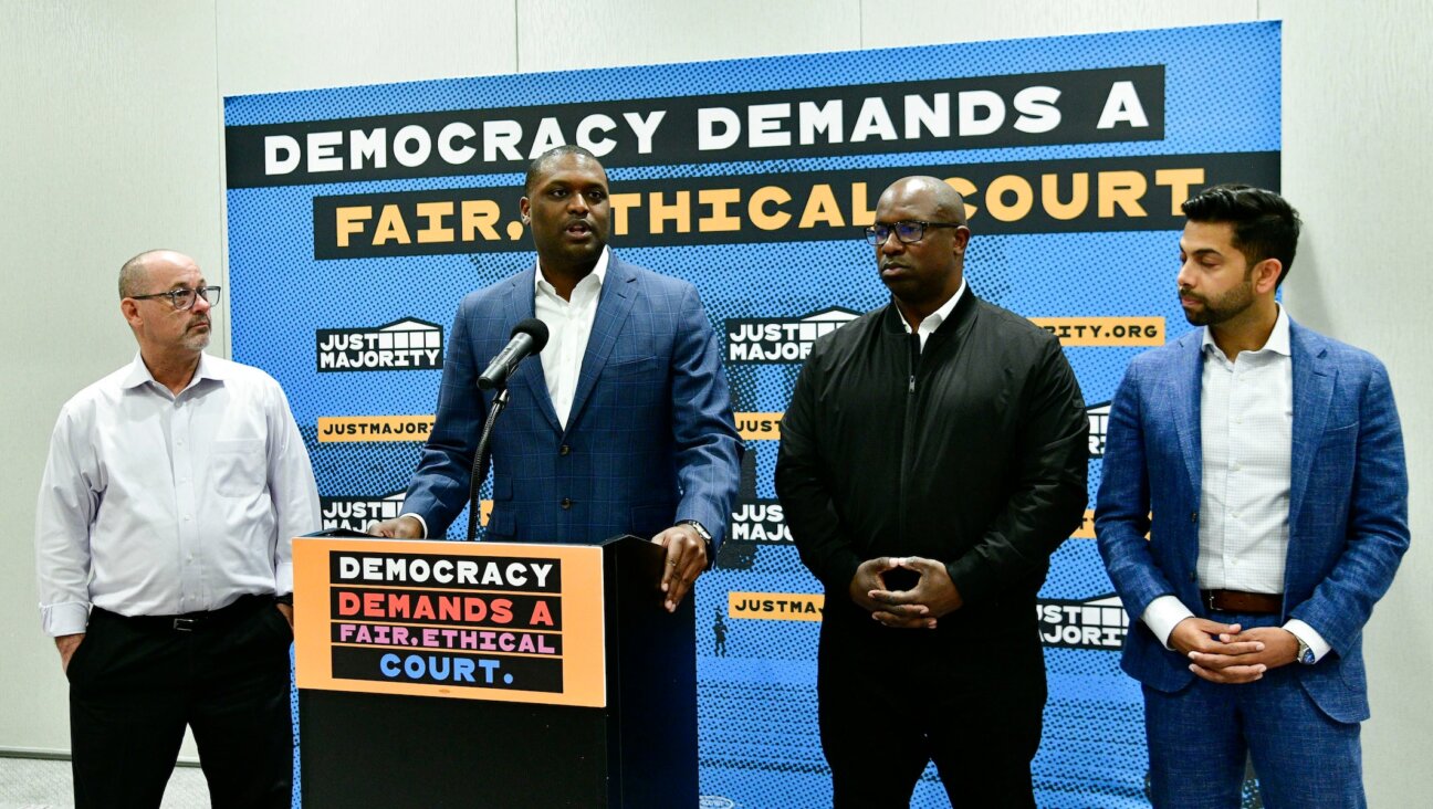 Mondaire Jones speaks at an anti-gun violence event in April 2023,c with Jamaal Bowman on his left. (Eugene Gologursky/Getty Images)
