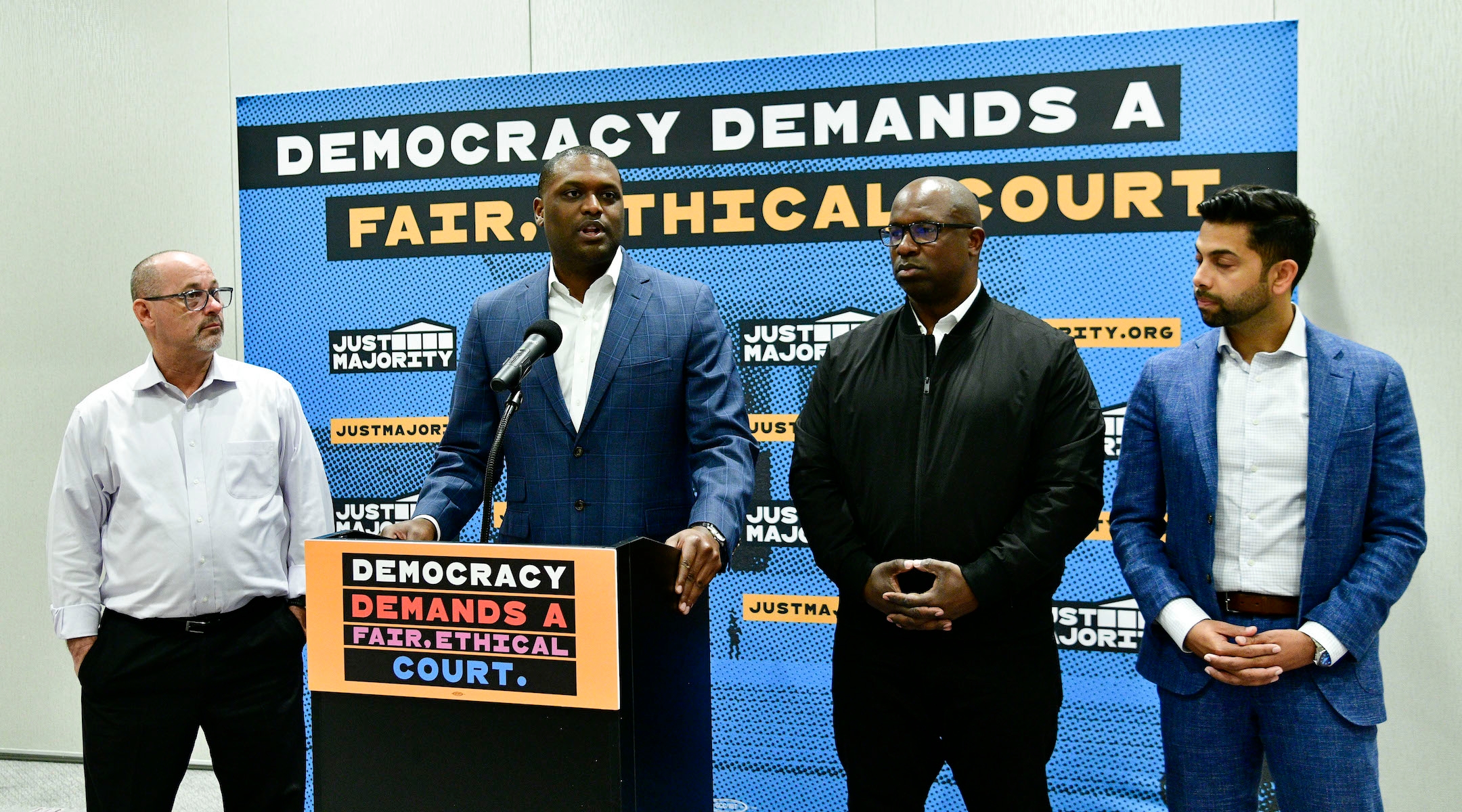 Mondaire Jones speaks at an anti-gun violence event in April 2023,c with Jamaal Bowman on his left. (Eugene Gologursky/Getty Images)
