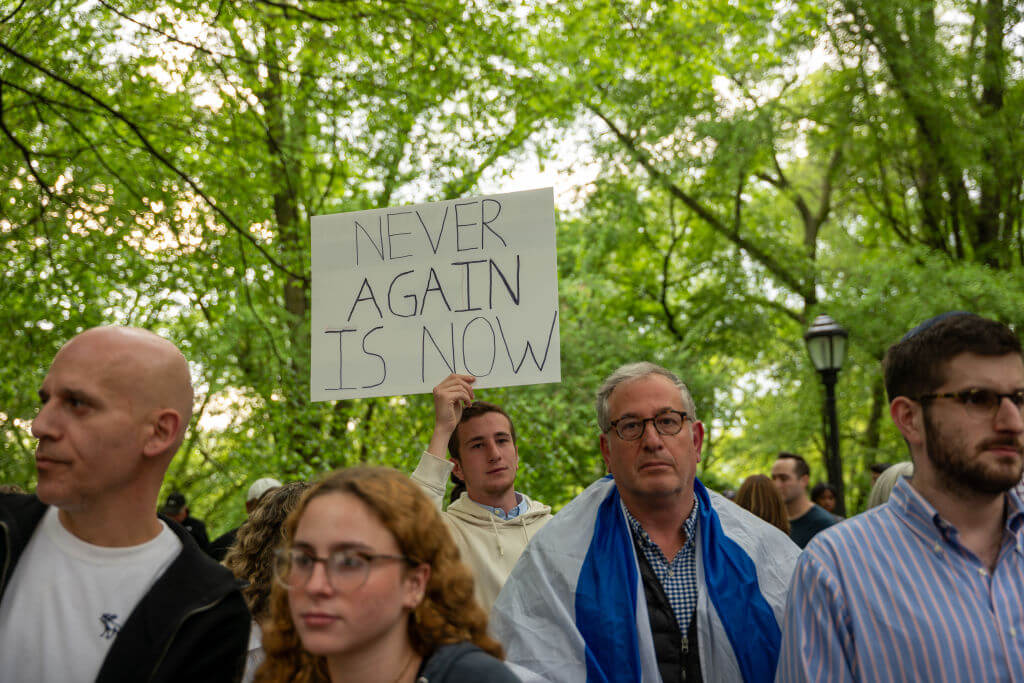 People attend a Holocaust memorial ceremony on May 06, 2024. 