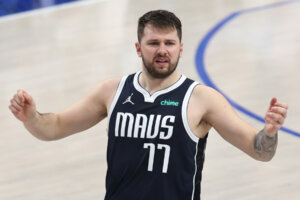 DALLAS, TEXAS - MAY 28:  Luka Doncic #77 of the Dallas Mavericks reacts during the second quarter against the Minnesota Timberwolves in Game Four of the Western Conference Finals at American Airlines Center on May 28, 2024 in Dallas, Texas. 