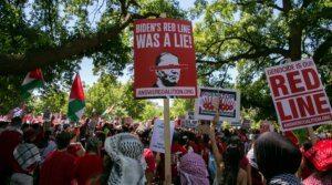 Thousands of pro-Palestinian demonstrators wearing red clothes surrounded the White House with a long red banner symbolizing President Biden’s ‘red line’ regarding an Israeli invasion of Rafah. (Probal Rashid/LightRocket via Getty Images)