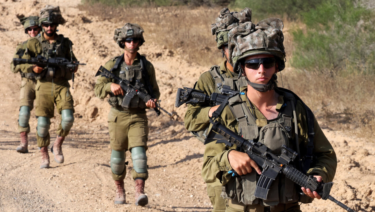 Israeli soldiers patrol around a position along Israel’s southern border with the Gaza Strip on June 13, 2024. (Jack Guez / AFP)