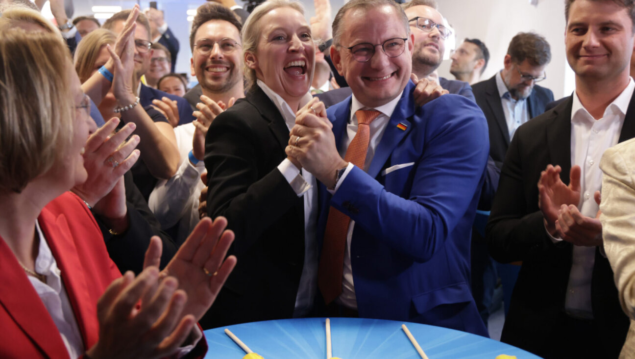 Tino Chrupalla and Alice Weidel, co-leaders of the far-right Alternative for Germany political party, celebrate at the AfD election evening gathering following the release of initial election results in European parliamentary elections in Berlin, June 9. (Sean Gallup/Getty Images)