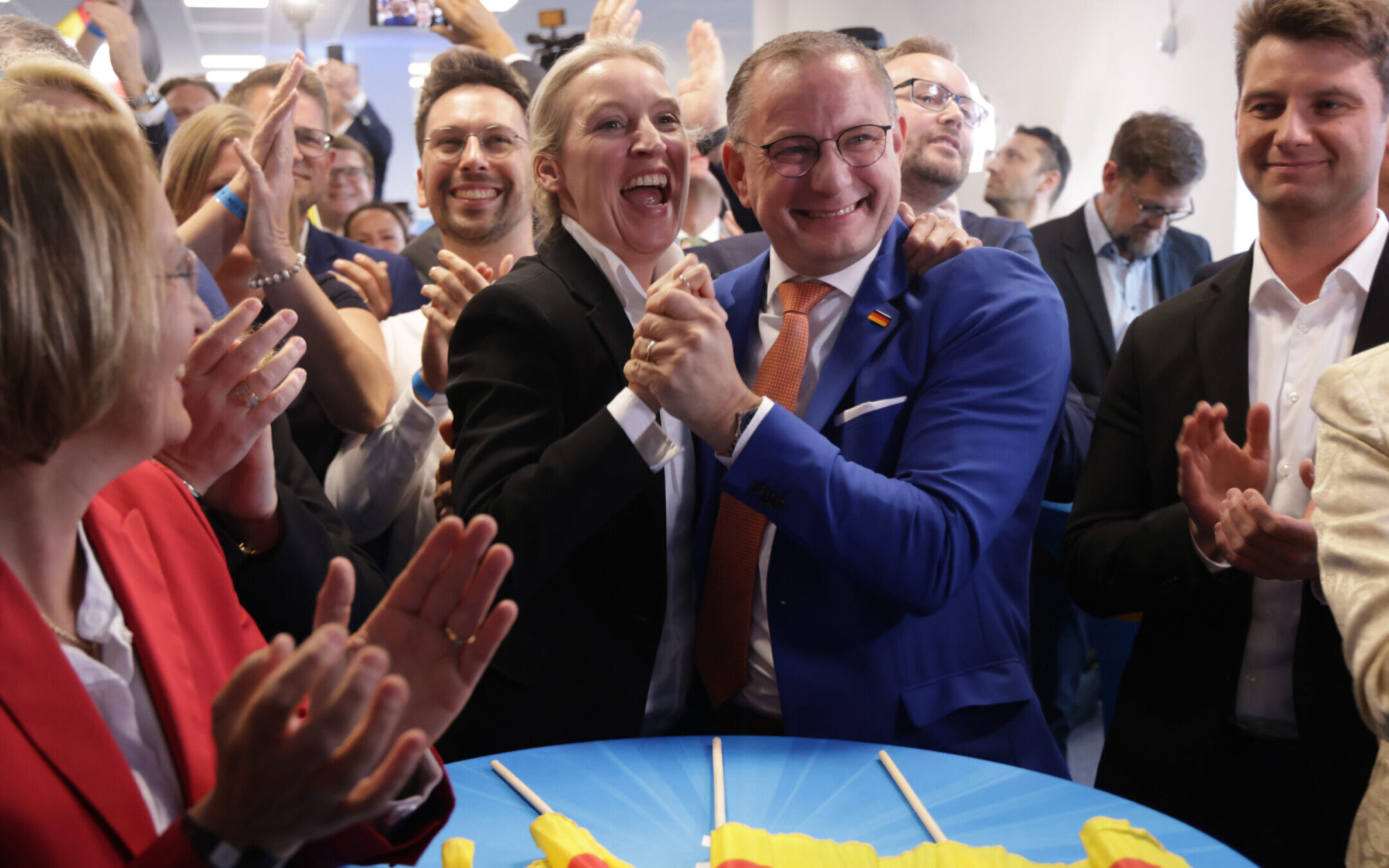 Tino Chrupalla and Alice Weidel, co-leaders of the far-right Alternative for Germany political party, celebrate at the AfD election evening gathering following the release of initial election results in European parliamentary elections in Berlin, June 9. (Sean Gallup/Getty Images)