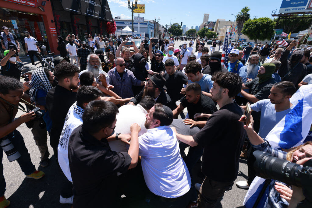 A clash between supporters of Israel and pro-Palestinian demonstrators outside Adas Torah, an Orthodox synagogue in Los Angeles on June 23.