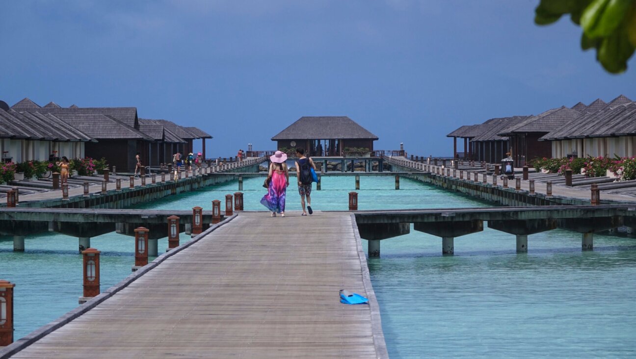 Maldives, a popular tourist destination, is iconic for its overwater villas, tropical forests, palm trees and beaches. (Nicolas Economou/NurPhoto via Getty Images)
