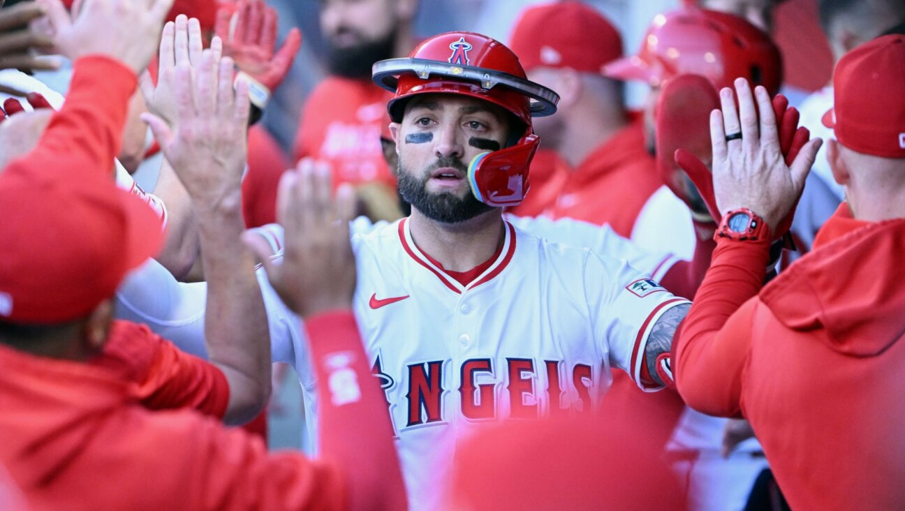 Kevin Pillar celebrating in the dugout after hitting a two-run home run against the New York Yankees, May 28, 2024, in Anaheim, CA. (John Cordes/Icon Sportswire via Getty Images)