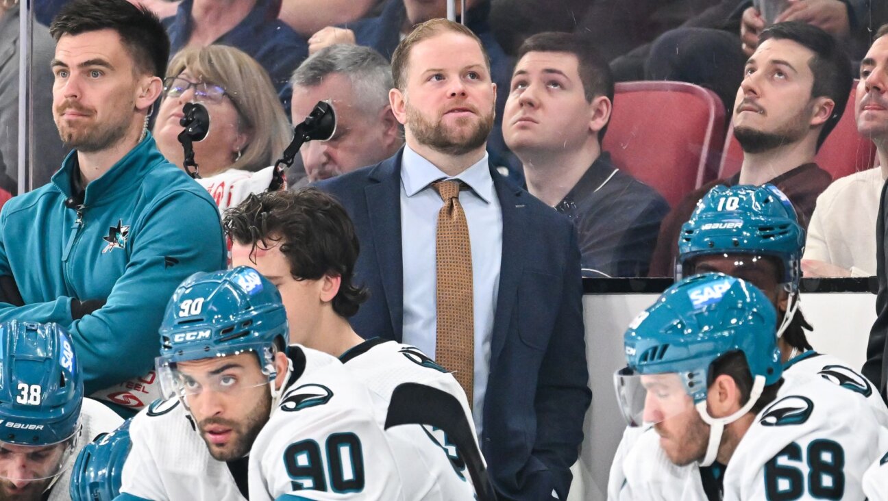San Jose Sharks assistant coach Ryan Warsofsky, center, during a game against the Montreal Canadiens, Jan. 11, 2024, in Montreal. (Minas Panagiotakis/Getty Images)
