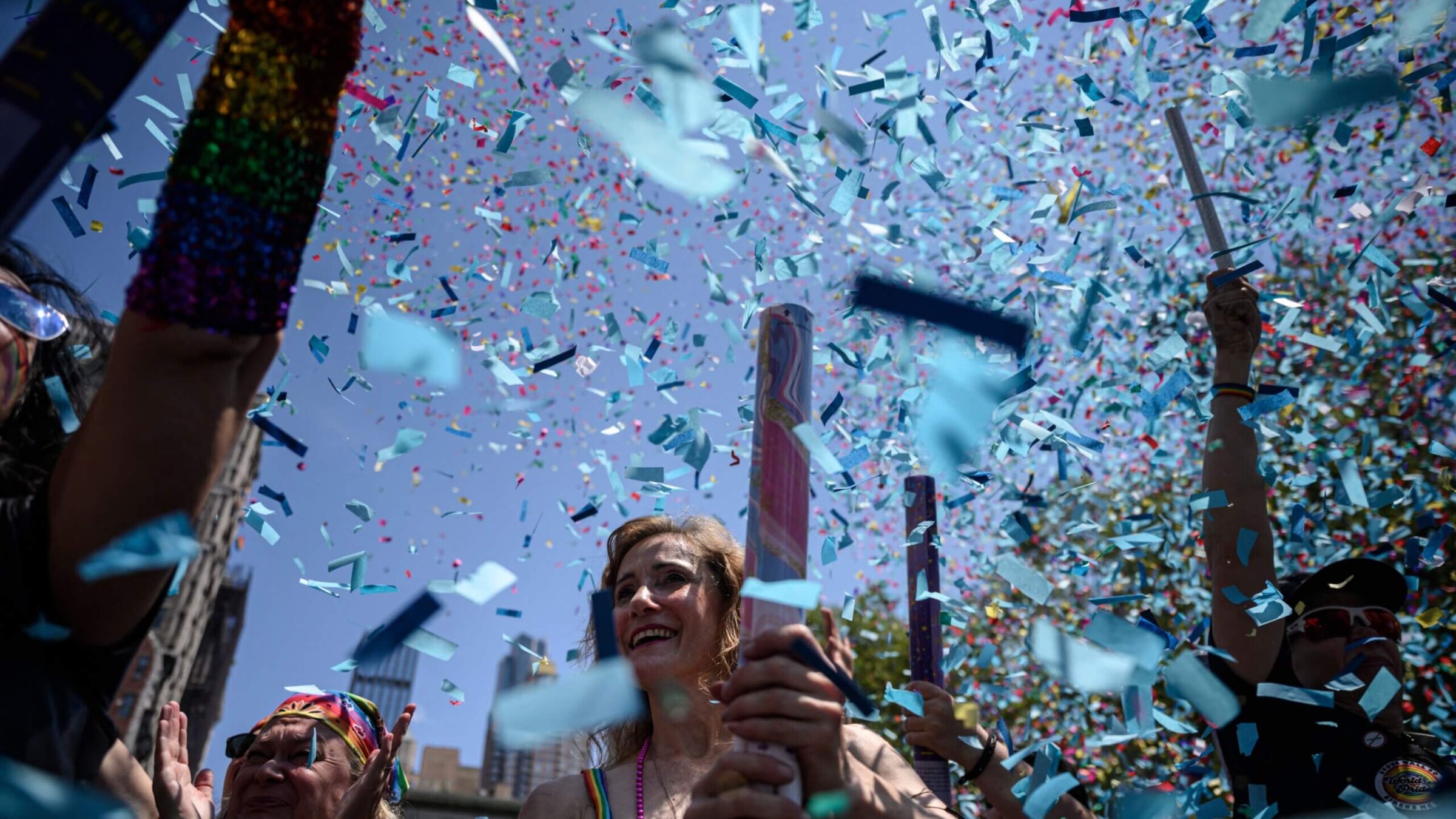 Confetti flies as participants march during the 2022 New York Pride Parade.