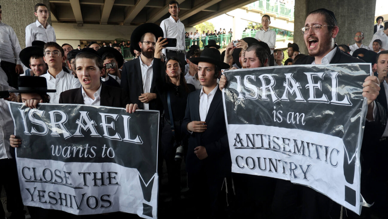 Haredi Jews in Israel block a highway during a protest against possible changes to laws exempting them from military service, in the central Israeli city of Bnei Brak, on June 20.