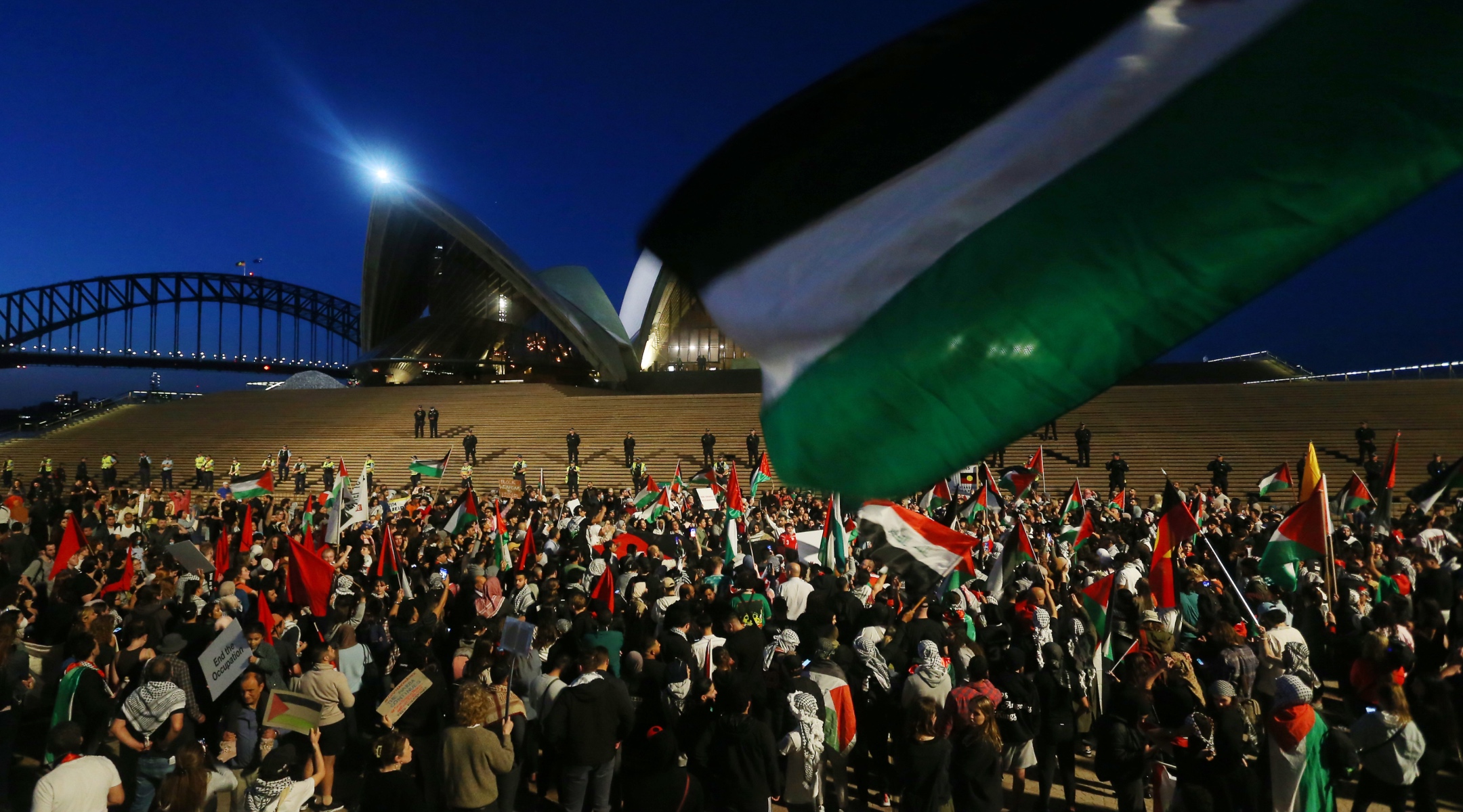 Pro-Palestinian activists rally outside the Sydney Opera House, Oct. 9, 2023. (Lisa Maree Williams/Getty Images)