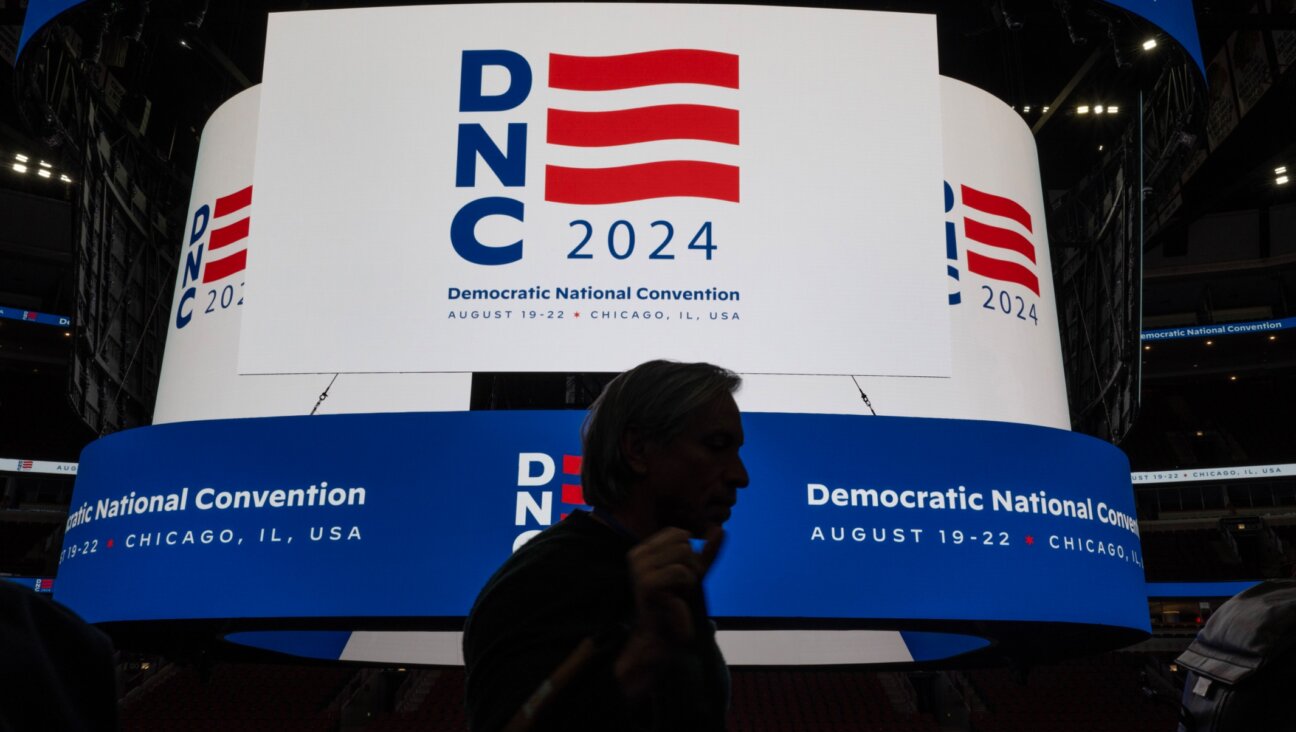 The logo for the Democratic National Convention is displayed on the scoreboard at the United Center during a media walkthrough in Chicago, Jan. 18, 2024. (Scott Olson/Getty Images)
