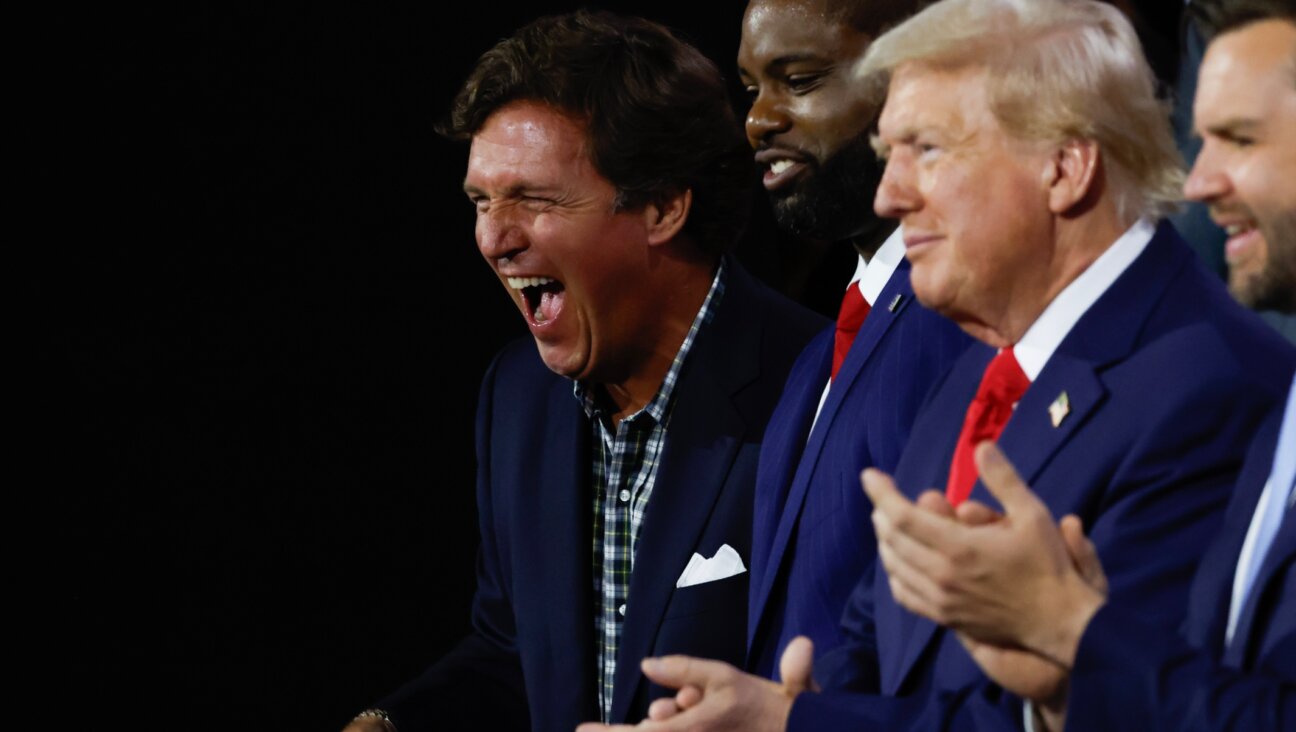 Tucker Carlson, U.S. Rep. Byron Donalds of Florida, former U.S. President Donald Trump, Sen. J.D. Vance of Ohio appear on the first day of the Republican National Convention at the Fiserv Forum, Milwaukee, July 15, 2024. (Chip Somodevilla/Getty Images)