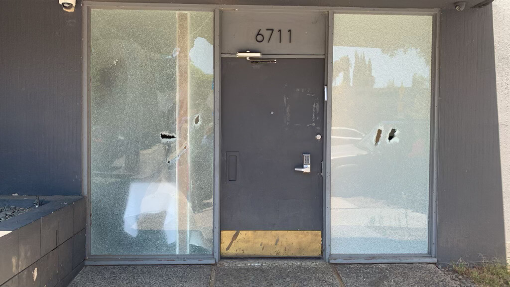 The entrance to Kahal Ahavas Yisroel, an Orthodox synagogue in Los Angeles, after it was vandalized on July 25. The glass panels have since been boarded up.