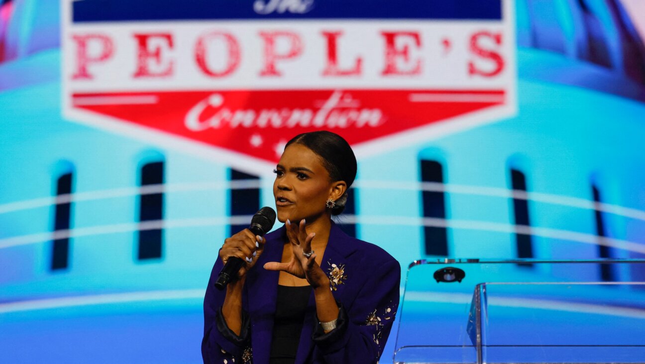 Candace Owens, conservative political commentator, speaks on stage during “Turning Point’s The Peoples Convention” on June 14, 2024 at Huntington Place in Detroit, Michigan. (Jeff Kowalsky/AFP via Getty Images)