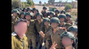 Israeli soldiers wearing donated tactical helmets pose for a photo. The donations were made by a American civilian initiative known as Unit 11741. (Courtesy of Unit 11741)