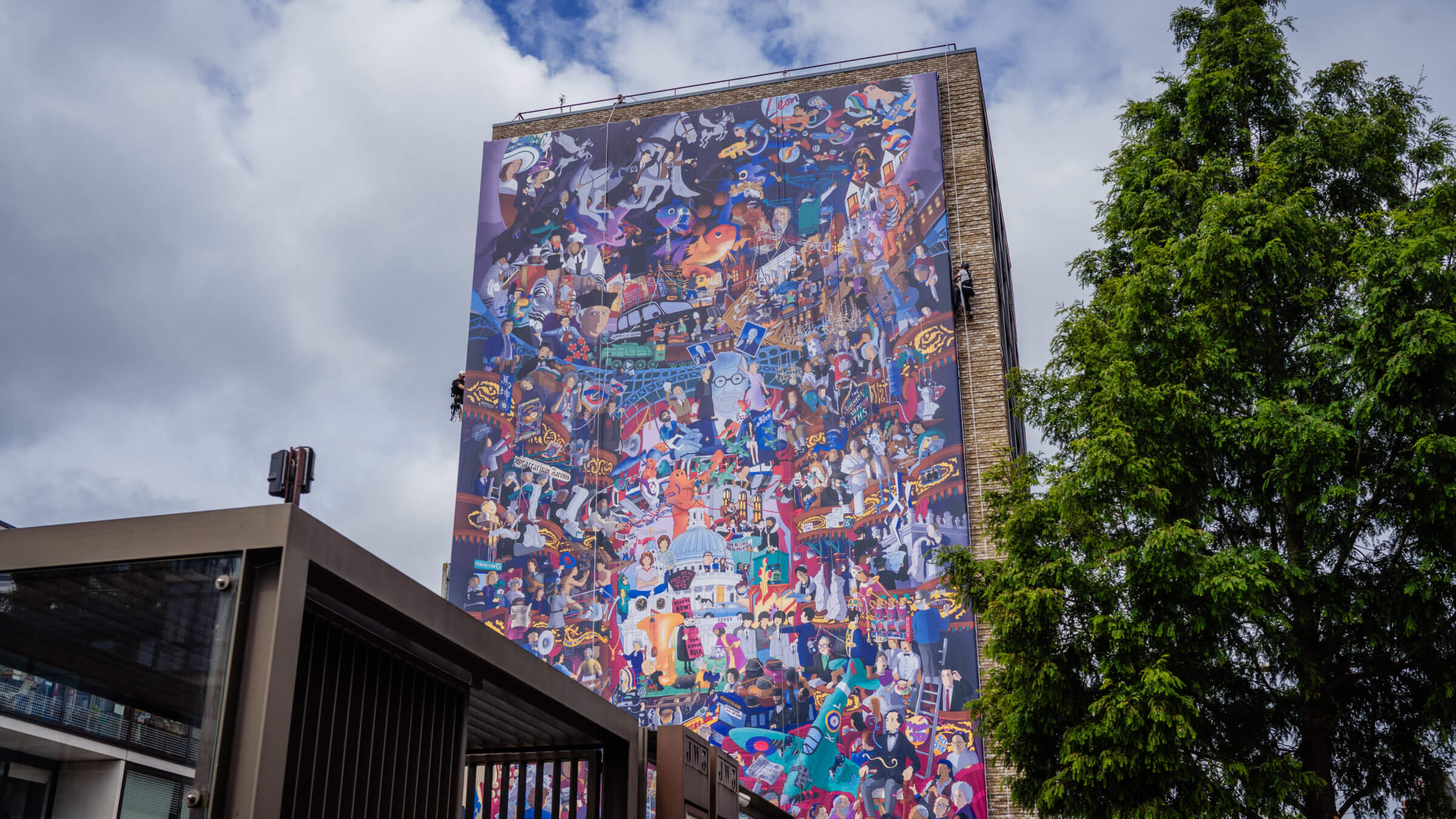 A view of Leon Fenster's mural of London Jewish history on JW3, the Jewish Community Centre London.