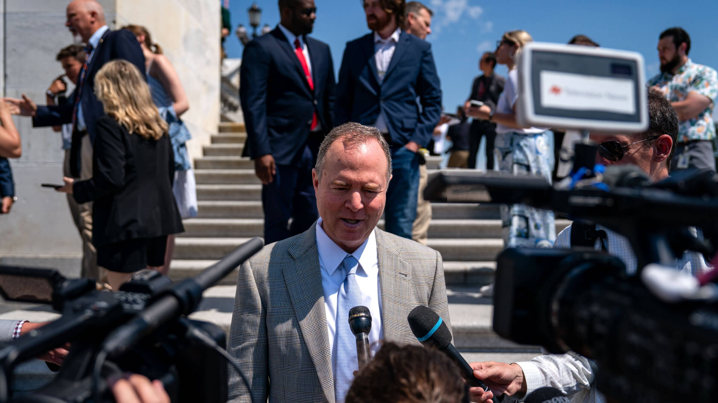 Rep. Adam Schiff (D-California) speaks with reporters on the steps of the U.S. House Of Representatives on June 14.