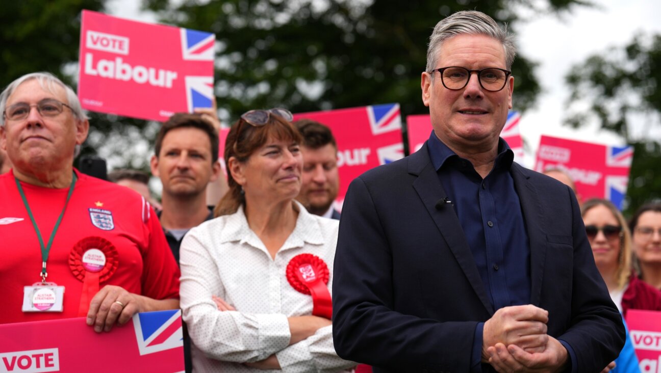 Labour Leader Sir Keir Starmer poses for photographers after delivering a stump speech at Hitchin Town Football Club on July 1, 2024 in Hitchin, England. (Carl Court/Getty Images)
